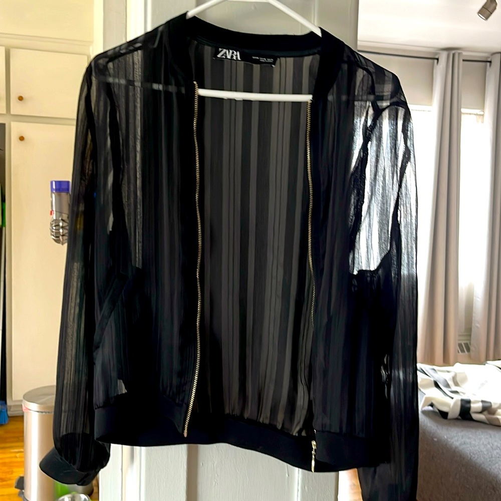 Zara see trou lights jackets black color